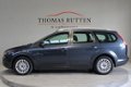 Ford Focus Wagon - 1.6 TDCi Limited 2010/ NAP/ Navi/ PDC/ Keyless Go/ Trekhaak/ Clima/ Cruise/ Stuur - 1 - Thumbnail