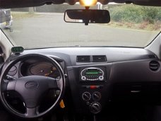 Daihatsu Cuore - 1.0 Premium