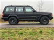 Jeep Cherokee - 4.0i Limited 4.0 4X4 AWD AIRCO LEDER LPG-G3 - 1 - Thumbnail