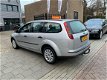 Ford Focus Wagon - 1.6 TDCI Trend Trekhaak Airco NAP APK 1 Jaar - 1 - Thumbnail