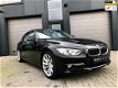 BMW 3-serie - 320i Luxury Navi Pro Sportinterieur Xenon Clima Leer Cruise Control - 1 - Thumbnail