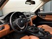 BMW 3-serie - 320i Luxury Navi Pro Sportinterieur Xenon Clima Leer Cruise Control - 1 - Thumbnail