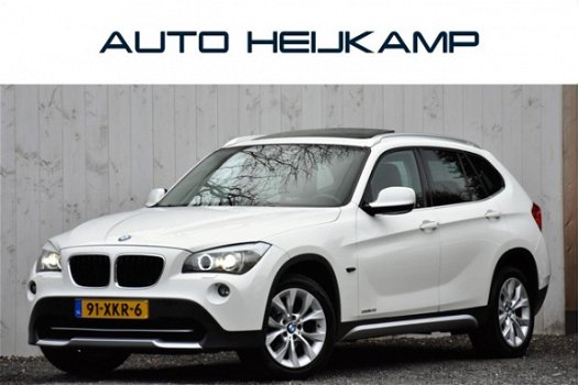 BMW X1 - sDrive20i | PANO-DAK | NAVI | XENON | NL-AUTO - 1