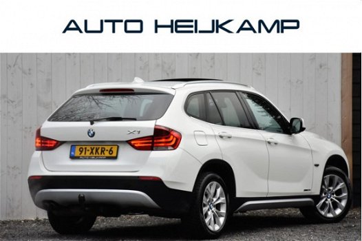 BMW X1 - sDrive20i | PANO-DAK | NAVI | XENON | NL-AUTO - 1