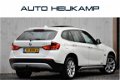 BMW X1 - sDrive20i | PANO-DAK | NAVI | XENON | NL-AUTO - 1 - Thumbnail