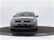 Volkswagen Golf - 1.2 Tsi 105pk Highline | Navigatie | Camera | P-Sensoren | Trekhaak | - 1 - Thumbnail