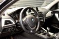 BMW 1-serie - 114i EDE Navi / Cruise / Airco - 1 - Thumbnail