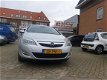 Opel Astra Sports Tourer - 1.4 Edition INCL NWE APKONDERHOUDSHISTORIE - 1 - Thumbnail