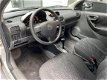 Opel Corsa - 1.4 16V Comfort AUTOMAAT 90.766 KM NAP - 1 - Thumbnail