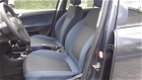 Opel Corsa - 1.4-16V Enjoy airco, cruise, 5 drs en maar 61.000 km NAP - 1 - Thumbnail