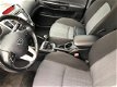Kia Cee'd Sporty Wagon - 1.4 CVVT Navigator Plus Pack 6/12 M Garantie - 1 - Thumbnail