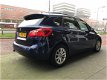 BMW 2-serie Active Tourer - 218i High Executive 2015 Leder Climatronic - 1 - Thumbnail