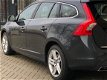 Volvo V60 - 2.4 D6 Twin Engine R-Design 2015 Grijs - 1 - Thumbnail