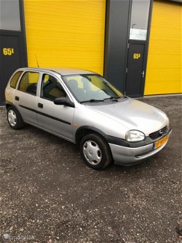 Opel Corsa - 1.2i-16V Strada Cool - 1