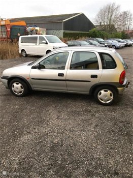 Opel Corsa - 1.2i-16V Strada Cool - 1