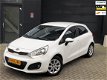 Kia Rio - 1.2 CVVT Plus Pack *Navi, Bluetooth, Airco - 1 - Thumbnail