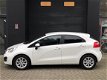 Kia Rio - 1.2 CVVT Plus Pack *Navi, Bluetooth, Airco - 1 - Thumbnail