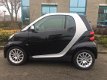 Smart Fortwo coupé - 1.0 mhd Pure PANORAMADAK/AIRCO/LMV/ELEK.RAMEN/ECO/NIEUW APK/RADIO CD-SPELER/ENZ - 1 - Thumbnail