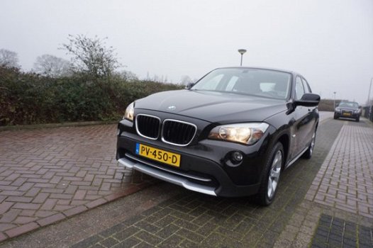 BMW X1 - SDRIVE 1.8D 143PK EXECUTIVE PERF.STAAT NAVI STOELVERWARMING CLIMA BLUETOOTH 17INCH PARKEER - 1