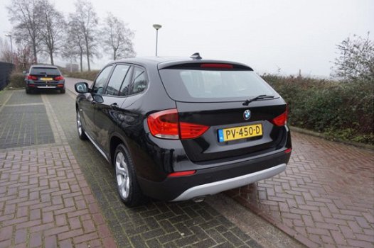 BMW X1 - SDRIVE 1.8D 143PK EXECUTIVE PERF.STAAT NAVI STOELVERWARMING CLIMA BLUETOOTH 17INCH PARKEER - 1