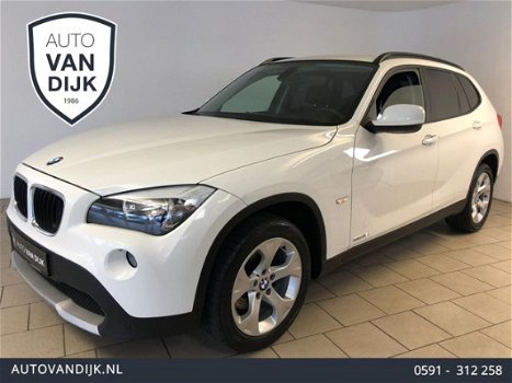 BMW X1 - 1.8i sDrive Executive AIRCO CLIMA NAVI BLUETOOTH VELGEN PDC REGENSENSOR PRIVACY GLAS NIEUW - 1