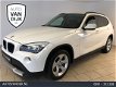 BMW X1 - 1.8i sDrive Executive AIRCO CLIMA NAVI BLUETOOTH VELGEN PDC REGENSENSOR PRIVACY GLAS NIEUW - 1 - Thumbnail