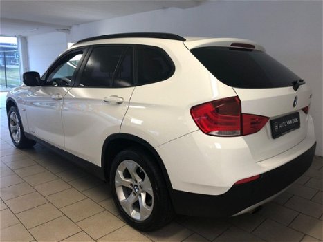 BMW X1 - 1.8i sDrive Executive AIRCO CLIMA NAVI BLUETOOTH VELGEN PDC REGENSENSOR PRIVACY GLAS NIEUW - 1