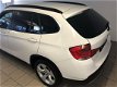 BMW X1 - 1.8i sDrive Executive AIRCO CLIMA NAVI BLUETOOTH VELGEN PDC REGENSENSOR PRIVACY GLAS NIEUW - 1 - Thumbnail