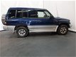 Mitsubishi Pajero - 2.8 GLS LB Panel Van 7p. Airco Trekhaak Aut EXPORT - 1 - Thumbnail