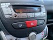 Toyota Aygo - 1.0 12v Comfort Navigator 1ste eig., Navig., Airco - 1 - Thumbnail