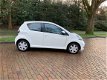 Toyota Aygo - 1.0 12v Comfort Navigator 1ste eig., Navig., Airco - 1 - Thumbnail