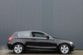 BMW 1-serie - 118i EffDyn. Ed. Business Line Ultimate Edition / NAVI / LEDER / SPORTSTOELEN - 1 - Thumbnail