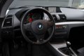 BMW 1-serie - 118i EffDyn. Ed. Business Line Ultimate Edition / NAVI / LEDER / SPORTSTOELEN - 1 - Thumbnail