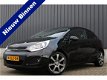 Kia Rio - 1.2 CVVT Plus Pack AIRCO/NAVI/LMV/PRIVACYGLASS/RIJKLAAR - 1 - Thumbnail