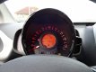 Toyota Aygo - 1.0 VVT-i x-play Airco, navigatie, elektrische ramen en centrale vergrendeling, achter - 1 - Thumbnail