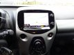Toyota Aygo - 1.0 VVT-i x-play Airco, navigatie, elektrische ramen en centrale vergrendeling, achter - 1 - Thumbnail