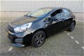 Kia Rio - 1.2 CVVT ComfortLine 5Drs /1e Eig/Airco/Cruise/15inch/NAP/7 jaar garantie - 1 - Thumbnail