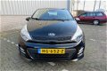 Kia Rio - 1.2 CVVT ComfortLine 5Drs /1e Eig/Airco/Cruise/15inch/NAP/7 jaar garantie - 1 - Thumbnail