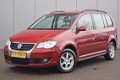 Volkswagen Touran - 1.4 TSI Highline 7 Persoons Clima Airco Stoelverw Cruise Xenon Automaat - 1 - Thumbnail