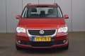 Volkswagen Touran - 1.4 TSI Highline 7 Persoons Clima Airco Stoelverw Cruise Xenon Automaat - 1 - Thumbnail