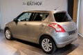 Suzuki Swift - 1.2 Comfort EASSS / KEYLESS ENTRY / CRUISE / STOELVERW. / - 1 - Thumbnail