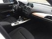 BMW 1-serie - 116i Business Automaat Navi - 1 - Thumbnail