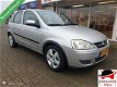 Opel Corsa - 1.2-16V Enjoy 5Drs Airco APK 01-2021 Keurige auto - 1 - Thumbnail