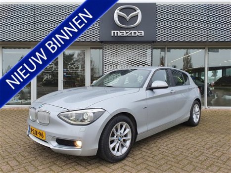 BMW 1-serie - 116i EDE EXECUTIVE | NAVIGATIE | BI-XENON VERLICHTING | HALF LEDEREN BEKLEDING | RIJKL - 1