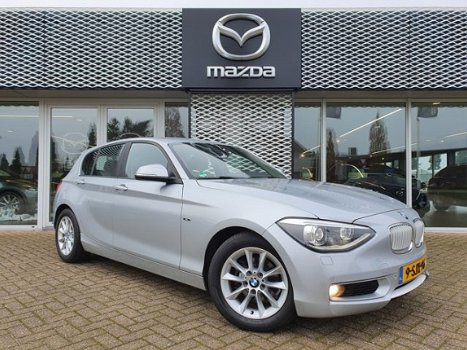 BMW 1-serie - 116i EDE EXECUTIVE | NAVIGATIE | BI-XENON VERLICHTING | HALF LEDEREN BEKLEDING | RIJKL - 1