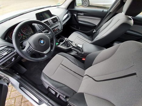 BMW 1-serie - 116i EDE EXECUTIVE | NAVIGATIE | BI-XENON VERLICHTING | HALF LEDEREN BEKLEDING | RIJKL - 1