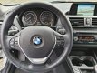 BMW 1-serie - 116i EDE EXECUTIVE | NAVIGATIE | BI-XENON VERLICHTING | HALF LEDEREN BEKLEDING | RIJKL - 1 - Thumbnail