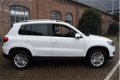 Volkswagen Tiguan - 2.0 TSI Sport&Style 4Motion DSG 2014 96.659KM Automaat Navi Clima Cruise P.D.C - 1 - Thumbnail