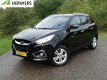 Hyundai ix35 - 1.6i GDI Style Orig. NL / Trekhaak (1200KG) / Clim ate - 1 - Thumbnail