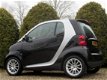 Smart Fortwo coupé - 1.0 mhd Passion Automaat / Airco / Panoramadak - 1 - Thumbnail